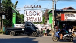Warga di Yogyakarta dan kawasan lain mulai membatasi akses masuk kampung sebagai upaya meminimalisasi penyebaran virus corona. (Foto: VOA/ Nurhadi)