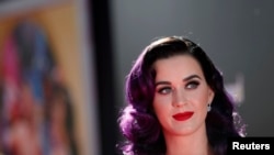 Cast member and singer Katy Perry poses at the premiere of "Katy Perry: Part of Me" at the Grauman's Chinese theatre in Hollywood, California June 26, 2012.