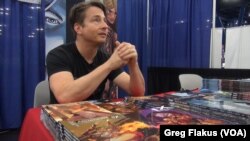 Los Angeles-based Matt Hawkins is a prolific and successful graphic novelist. He had a booth at Comicpalooza, in Houston. He contracts artists from around the world to create the visual realization of his stories.