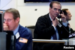 Traders work on the floor of the New York Stock Exchange in New York City, May 18, 2017. Financial markets recovered following a sharp downturn a day earlier after news broke of the special counsel's appointment.