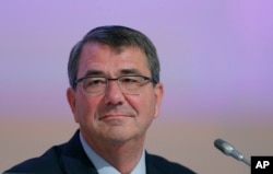 FILE - U.S. Secretary of Defense Ashton Carter delivers a speech during the 14th International Institute for Strategic Studies Shangri-la Dialogue, or IISS, Asia Security Summit, May 30, 2015.