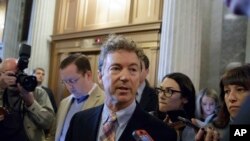 FILE - Sen. Rand Paul, R-Ky., speaks with reporters on Capitol Hill in Washington, April 7, 2017.