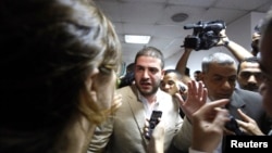 Osama Morsi, son of Egypt's ousted President Mohamed Morsi, speaks to the media after a news conference in Cairo Jul. 22, 2013.