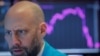 A trader works on the floor of the New York Stock Exchange, Feb 27, 2020. Wall Street's main indexes tumbled for a sixth straight session.