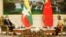 China's State Councillor and Foreign Minister Wang Yi is welcomed by and Myanmar's state counsellor Aung San Suu Kyi in Naypyitaw, Myanmar, Jan. 11, 2021.