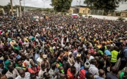 Malians supporting the recent overthrow of President Ibrahim Boubacar Keita gather to celebrate in the capital Bamako, Mali, Aug. 21, 2020.