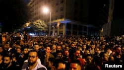 Demonstrators gather during a protest over the deteriorating economic situation in Beirut, Lebanon, Oct. 17, 2019. 