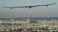 Solar Impulse flying over Paris in 2011. (© Solar Impulse | Jean Revillard )