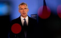FILE - NATO Secretary General Jens Stoltenberg speaks at NATO headquarters in Brussels, June 26, 2020.