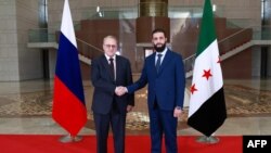 Hevdîtina Mikhail Bogdanov ligel rêberê defakto yê Sûrîyê Ehmed el Şeri'