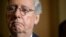 FILE - Senate Majority Leader Mitch McConnell speaks to the media during a news conference following a Senate policy luncheon on Capitol Hill.