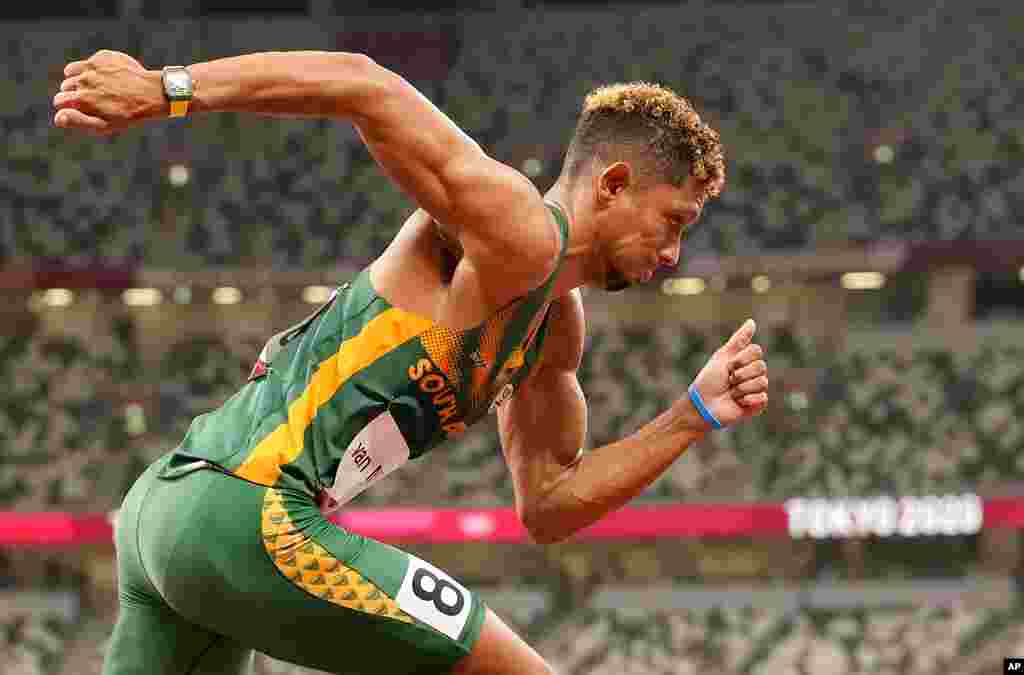 Wayde Van Niekerk, of South Africa starts a men's 400-meter heat at the 2020 Summer Olympics, Monday, Aug. 2, 2021, in Tokyo, Japan. (AP Photo/Martin Meissner)