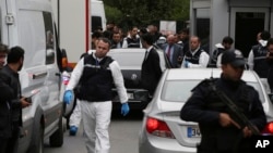 Turkish police gather outside the residence of the Saudi consul General Mohammed al-Otaibi to conduct a search after the disappearance and alleged slaying of writer Jamal Khashoggi, in Istanbul, Oct. 17, 2018.