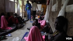 Wounded fighters from the Lou Nuer ethnic group, most of whom suffered gunshot wounds from recent fighting with Murle in Jonglei state, recover at a hospital in the state capital Bor where the atmosphere is more boastful and vengeful than sombre.