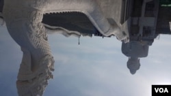 A massive hilltop Buddhist temple is a popular draw for tourists on the Thai island of Phuket. (VOA News)