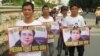 Supporters of Le Quoc Quan march in Hanoi, Oct. 2, 2013. (Marianne Brown for VOA) 