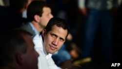 El líder de la oposición venezolana Juan Guaidó asiste a una reunión con líderes locales en Caracas. Marzo 14, 2019. Foto: AFP.