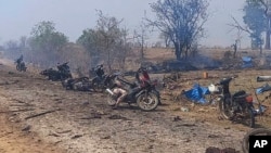 This photo provided by the Kyunhla Activists Group shows the aftermath of an airstrike in Pazigyi village in Sagaing Region's Kanbalu Township, Myanmar, April 11, 2023. (Kyunhla Activists Group via AP)