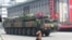FILE - A North Korean military vehicle carries what is believed to be a Taepodong-class ballistic missile during a military parade in Pyongyang, April 15, 2012. 