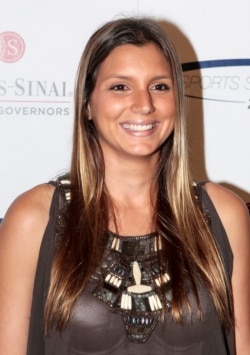 FILE - Surfer Maya Gabeira arrives for the 27th anniversary Sports Spectacular at the Hyatt Regency Century Plaza in Los Angeles, May 20, 2012.