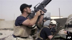 Contractors working for Blackwater USA take part in a firefight in the Iraqi city of Najaf (file)