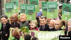 Oxfam’s Big Heads depict G20 leaders take part in protests ahead of the upcoming G20 summit in Hamburg, Germany, July 2, 2017.