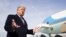 U.S. President Donald Trump talks to reporters prior to boarding Air Force One as he departs Washington to campaign in California from Joint Base Andrews in Maryland, Feb. 18, 2020.