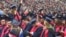 Some of the six thousand Liberty University graduates are seen in the school's football stadium for the university's 44th commencement, in Lynchburg, Virginia, May 13, 2017. (C. Presutti/VOA)