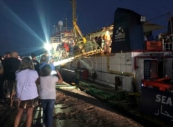 The Dutch-flagged Sea-Watch 3 ship docks at the Lampedusa harbor, Italy, early June 29, 2019.