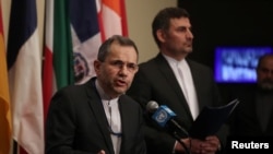 FILE - Iranian Ambassador to the United Nations Majid Takht-Ravanchi speaks to the media outside Security Council chambers at the UN headquarters in New York, June 24, 2019. 