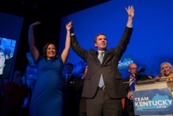Democratic gubernatorial candidate and Kentucky Attorney General Andy Beshear, along with lieutenant governor candidate Jacqueline Coleman, acknowledge supporters at the Kentucky Democratic Party.