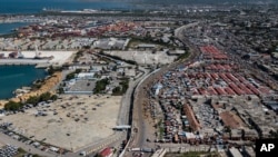 FILE - the port of Varreux is showing in Port-au-Prince, Haiti, Oct. 24, 2021. Police said they recovered a hijacked cargo ship that left the port on Thursday.