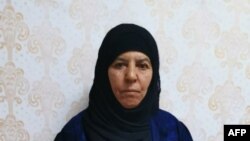 This handout undated picture taken and released by the press service of the Turkish Government, shows Rasmiya Awad, believed to be the sister of slain Islamic State leader Abu Bakr al-Baghdadi, at an unknown location.