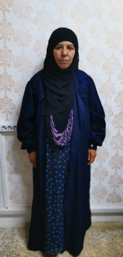 This handout undated picture taken and released by the press service of the Turkish Government, shows Rasmiya Awad, believed to be the sister of slain Islamic State leader Abu Bakr al-Baghdadi, at an unknown location.