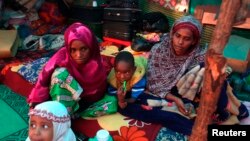 A Muslim family camps at Ecole Liberte (Freedom School) in Bossangoa, north of the capital Bangui in the Central African Republic, Dec. 30, 2013.