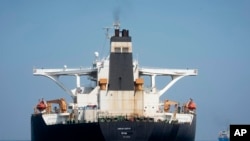 FILE - The Grace 1 super tanker, with the name "Adrian Darya 1" where "Grace 1" had been blackened out, is seen in the British territory of Gibraltar, Aug. 17, 2019. 