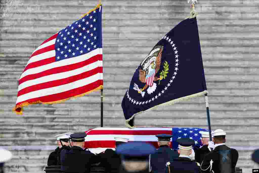 U.S. Military joint force pallbearers carry the flag-draped casket of former President Jimmy Carter into the U.S. Capitol, where he will lie in state, in Washington, on Jan. 7, 2025. 