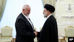 اسماعیل هنیه درست‌در دست ابراهیم رئیسی