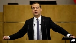 FILE - Russian Prime Minister Dmitry Medvedev addresses the State Duma in Moscow, April 22, 2014.