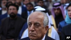FILE - Washington peace envoy Zalmay Khalilzad attends the inauguration ceremony for Afghan President Ashraf Ghani at the presidential palace in Kabul, Afghanistan, March 9, 2020.