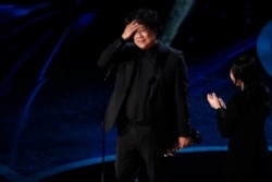 Bong Joon Ho wins the Oscar for Best Director for "Parasite" at the 92nd Academy Awards in Hollywood, Los Angeles, Calif., Feb. 9, 2020.