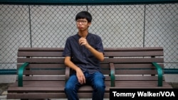 FILE: Activist Tony Chung weeks before he was arrested outside the U.S. Embassy in Hong Kong last year, Oct. 7, 2020. 
