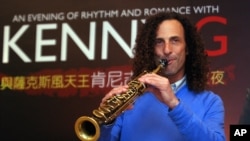FILE - Jazz saxophonist Kenny G performs during a media event announcing his 2010 concert in Taiwan.