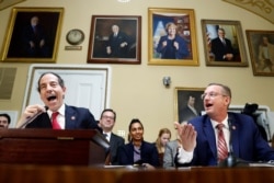 Rep. Jamie Raskin, D-Md., left, and House Judiciary Committee ranking member Rep. Doug Collins, R-Ga., speak during a House Rules Committee hearing on the impeachment against President Donald Trump, Dec. 17, 2019, on Capitol Hill.