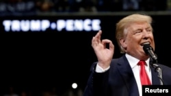 FILE - Republican U.S. presidential nominee Donald Trump speaks at a campaign rally in Wilkes-Barre, Pennsylvania, October 10, 2016. The candidate lost a court ruling in Pennsylvania on poll monitoring.
