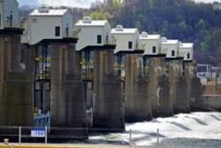 FILE - These are the Emsworth Locks and Dam on the Ohio River at Emsworth, Pa., April 9, 2021. They are 70 years old and in need of repair.