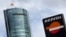 A Repsol logo is seen in front of Torre Espacio building in Madrid April 13, 2012. 