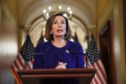 House Speaker Nancy Pelosi reads a statement announcing a formal impeachment inquiry into President Donald Trump, on Capitol Hill in Washington, Sept. 24, 2019.