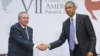 FILE - President Barack Obama and Cuban President Raul Castro meet for an informal talk on the sidelines of the Summit of the Americas in Panama City, April 11, 2015. 