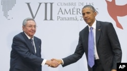 File - U.S. President Barack Obama and Cuban President Raul Castro meet for an informal talk on the sidelines of the Summit of the Americas in Panama City, April 11, 2015. 